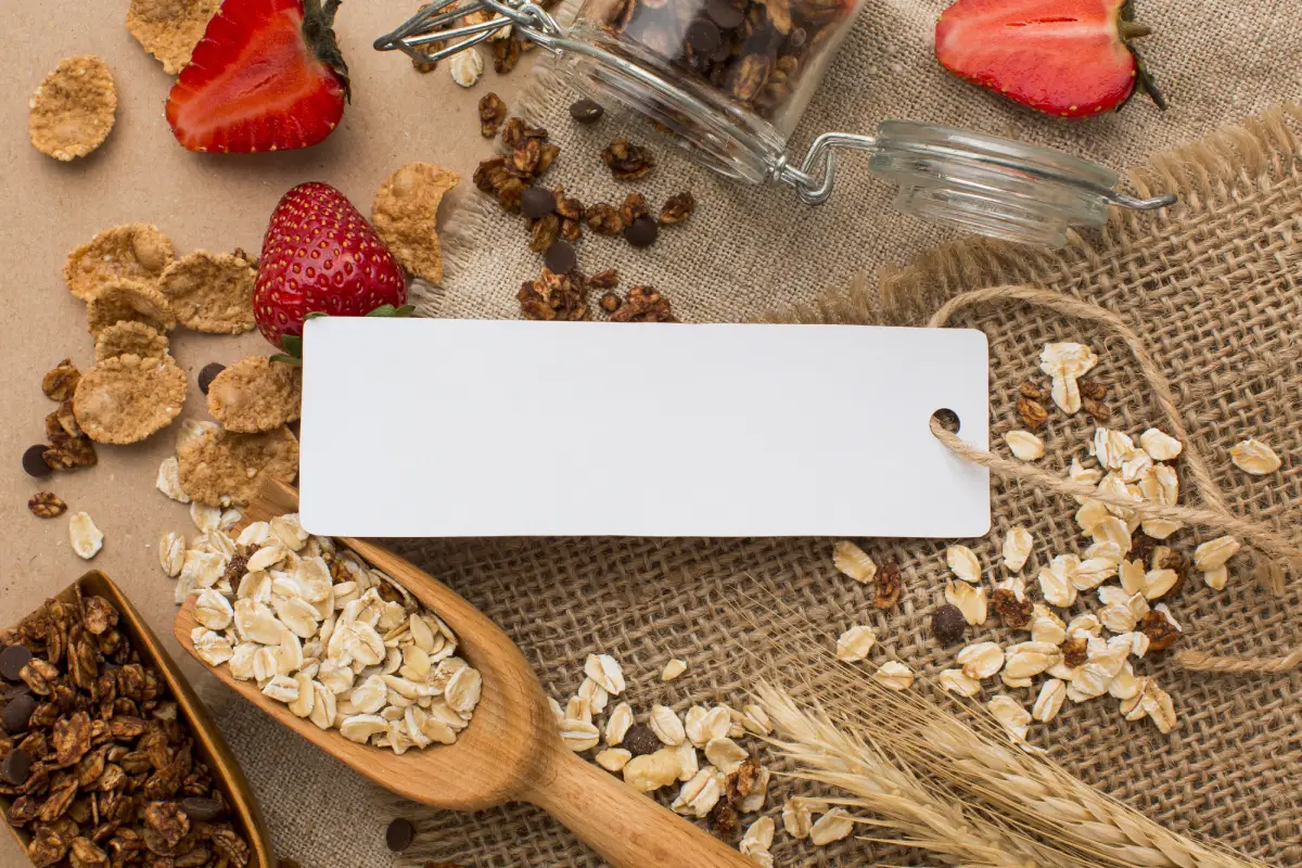 Assorted high-protein snack bars on a wooden table.